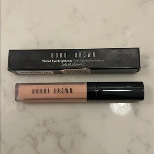 Tinted eye brightener